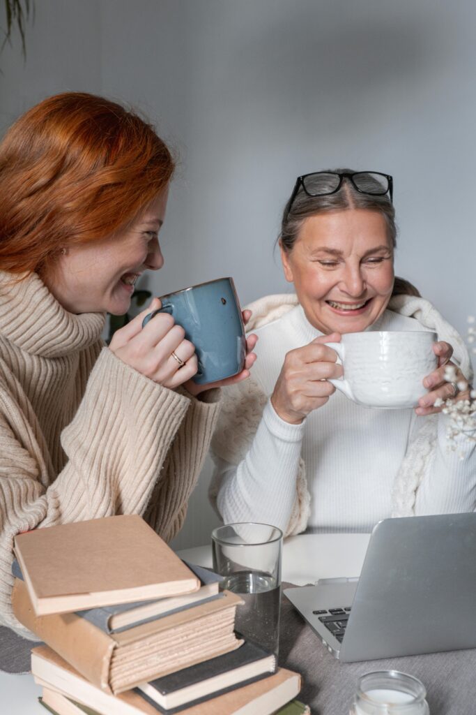 A heartwarming moment of a mother and daughter sharing coffee at home, radiating warmth and togetherness.